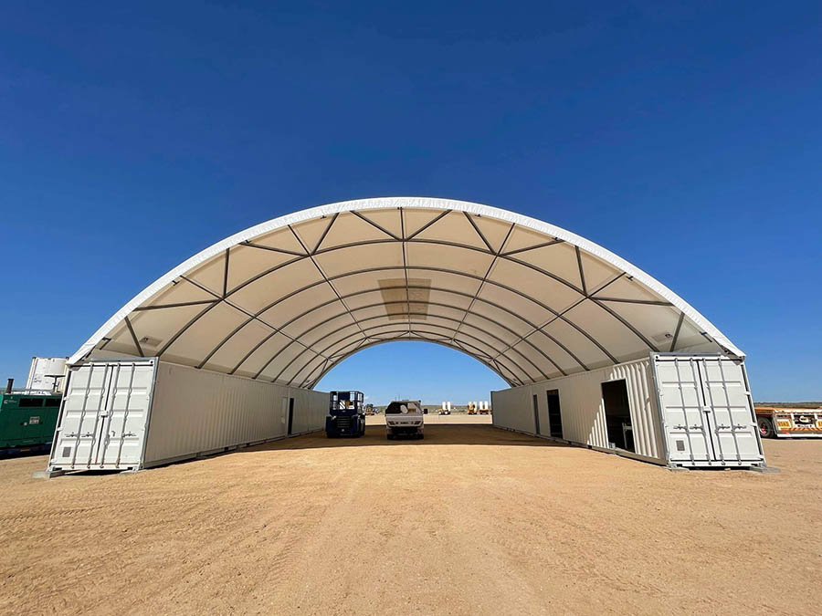 A wide container dome shelter designed for industrial storage and efficient organisation of materials.