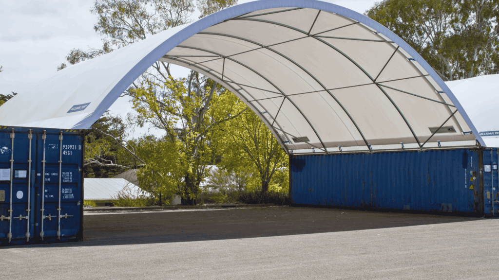 A large white container building with a spacious white roof, designed as an express shelter for various uses.